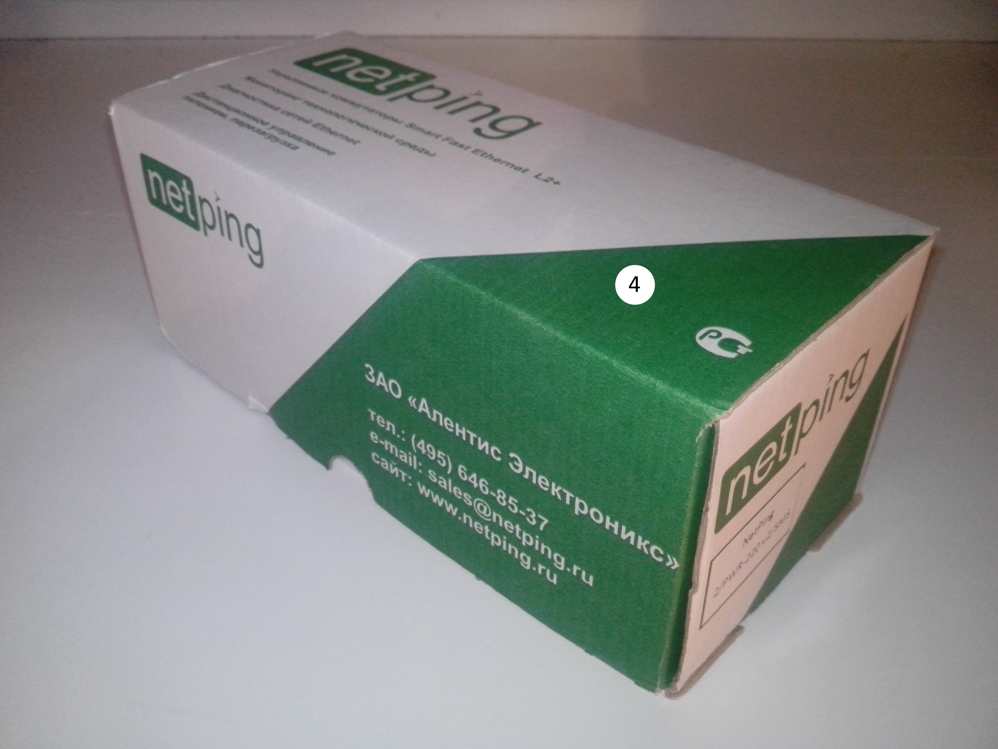 Packaging box of a NetPing 2PWR-220 v2SMS device